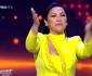 Andra are o rochie lungă galbenă în marea finală / Foto: Captură video