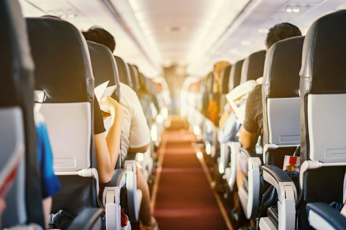 Pasageri în avion FOTO Shutterstock