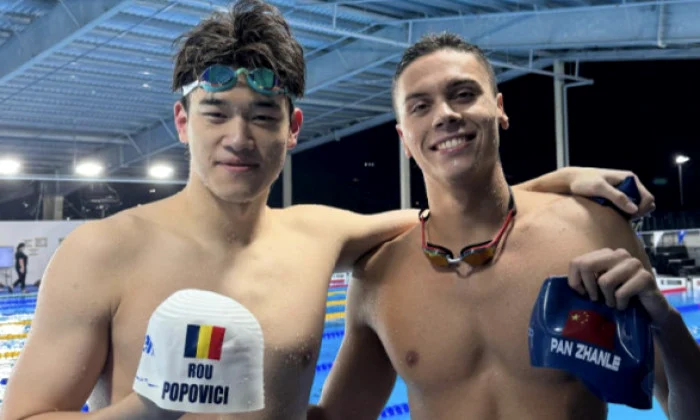 Zhanle și Popovici, deținătorii celor mai buni timpi din istorie la 100 m. Foto World Aquatics
