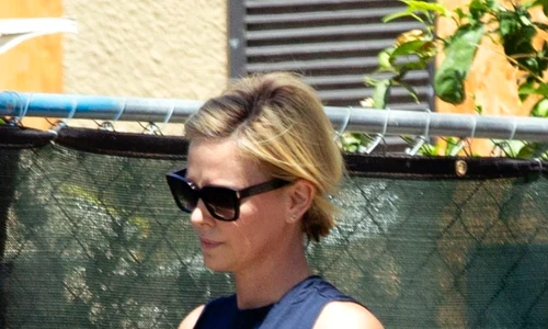 *EXCLUSIVE* Braless Charlize Theron picks up her kids after a workout jpeg