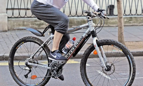 *EXCLUSIVE* WEB MUST CALL FOR PRICING   Superstar Singer Madonna pictured back in London! The singer was out enjoying the Heatwave as she's seen on her Bike with family and friends jpeg