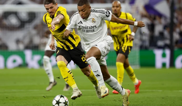 Kylian Mbappé (dreapta), arbitrat de István Kovács (FOTO: EPA)