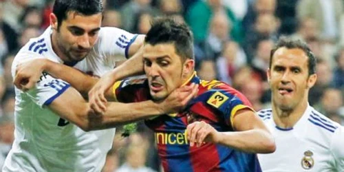 Foto: reuters David Villa (dreapta), în duel cu Albiol de la Real
