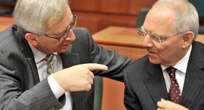 Jean-Claude Junker (stânga) şi Wolfgang Schauble