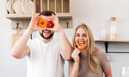 couple playing with bell pepper jpg
