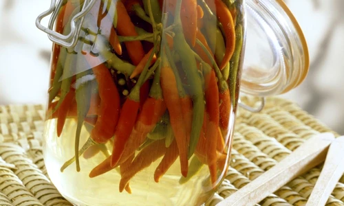 jar of hot green and yellow peppers in vinegar jpeg