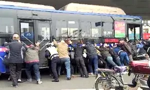 teaser 20 people lift bus off man jpeg