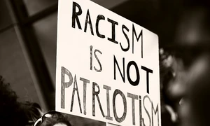 Racism is not patriotism sign in Edison, NJ jpg