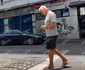 Mihai Bujor Sion a fost surprins îmbrăcat lejer, cu pantaloni scurți negri și un tricou simplu gri / foto: Spynews