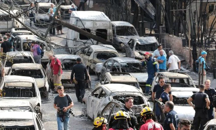 FOTO Imagini înfiorătoare din Grecia, unde cel puţin 60 de persoane au murit şi peste 160 au fost rănite în incendii devastatoare jpeg