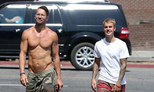 *EXCLUSIVE* Justin Bieber lays down in the grass with a couple of friends jpeg