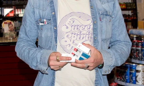 Macaulay Culkin was seen picking up Three packets of Parliament Cigarettes as a Gas station on Sunset Blvd in West Hollywood, CA jpeg