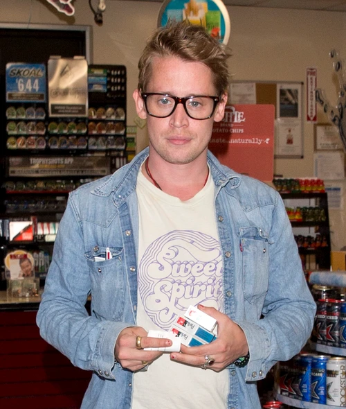 Macaulay Culkin was seen picking up Three packets of Parliament Cigarettes as a Gas station on Sunset Blvd in West Hollywood, CA jpeg