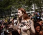 Femei defilează în sânii goi în timpul parade GoTopless pride în Manhattan New York FOTO Guliver/GettyImages