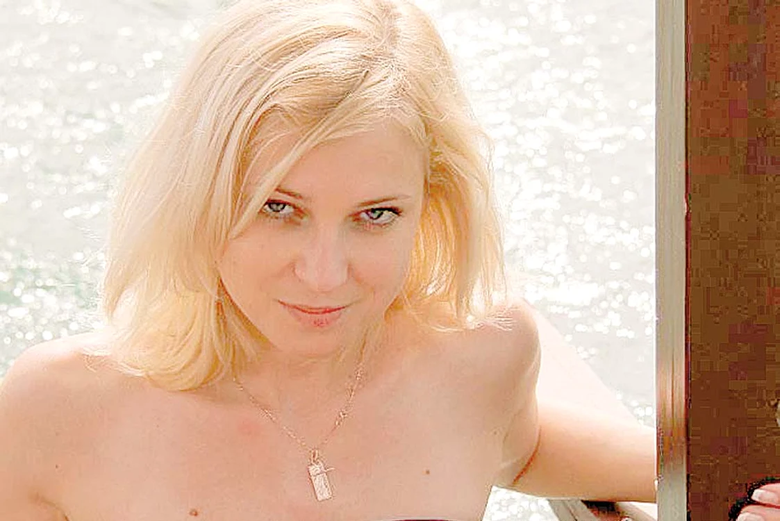 Sexy-procuroarea  l-a cucerit şi pe Putin  cu formele ei senzuale