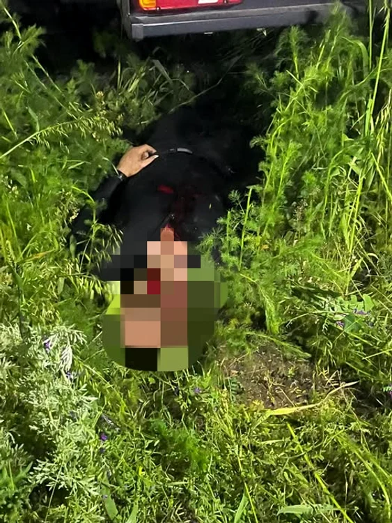 Cadavrul lui Robert Wolf a fost găsit de polițiști în iarbă FOTO: Sindicatul Europol