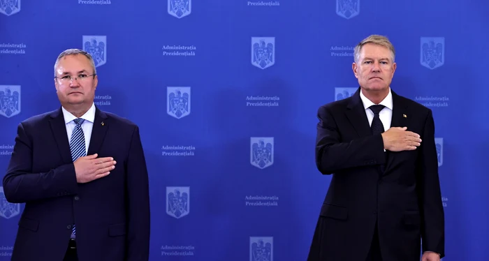 Nicolae Ciucă și Klaus Iohannis sunt clienții unor bănci austriece FOTO Guvernul României