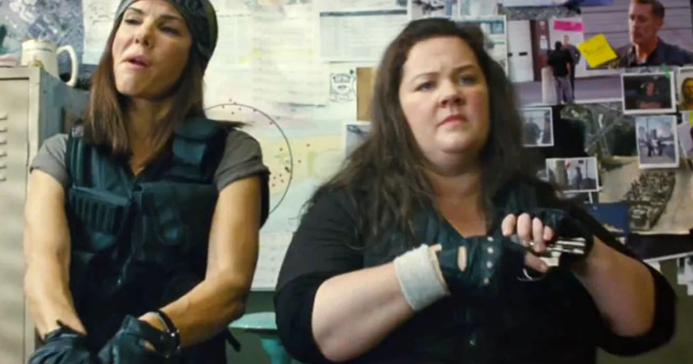 Sandra Bullock şi Melissa McCarthy, într-o scenă din pelicula „The Heat - Captură la dublu” FOTO Odeon Film