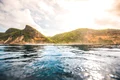 breathtaking view ocean cliffs covered with plants captured lombok indonesia jpg