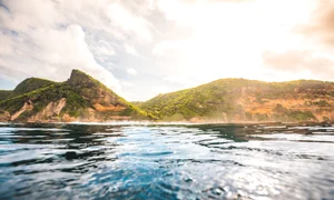 breathtaking view ocean cliffs covered with plants captured lombok indonesia jpg