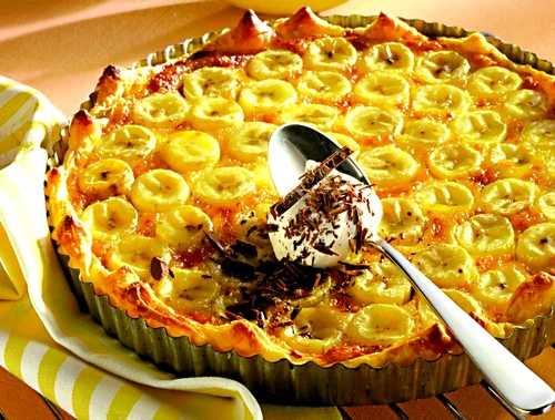 Banana and honey tart with a spoonful of cream jpeg