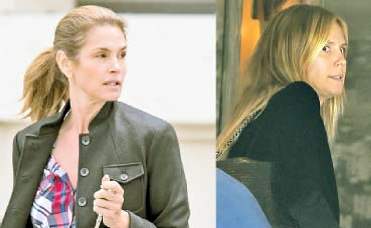 Cindy Crawford, crispată pe stradă, iar Heidi Klum, cu ochii bulbucaţi la vederea aparatului fotoFoto: Guliver / Splashnews