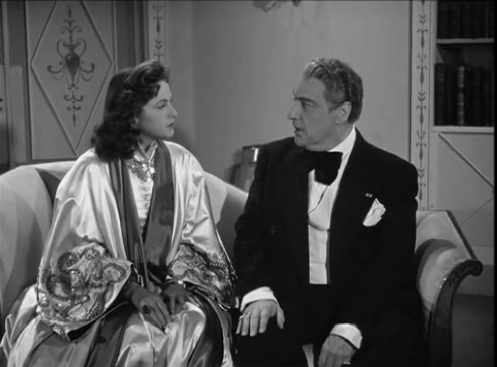 Lana Marconi și soțul ei, Sacha Guitry, într-o scenă dintr-unul dintre filmele la care au lucrat împreună de-a lungul unui deceniu de căsnicie