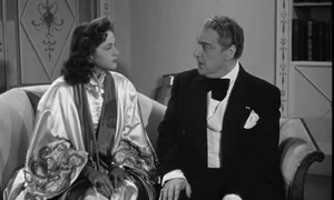 Lana Marconi și soțul ei, Sacha Guitry, într o scenă dintr unul dintre filmele la care au lucrat împreună de a lungul unui deceniu de căsnicie jpeg