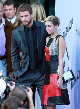 Liam Hemsworth & Miley Cyrus Attend 'Paranoia' Premiere Together jpeg