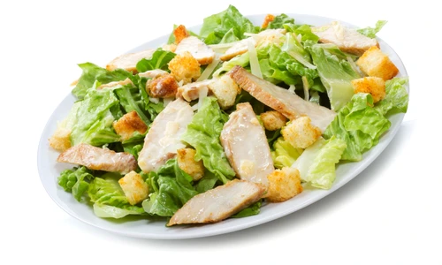 9574604   caesar salad on white background jpeg