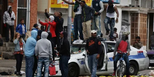 Haos în Baltimore din cauza luptelor dintre tineri negri şi poliţie Guliver/Getty Images