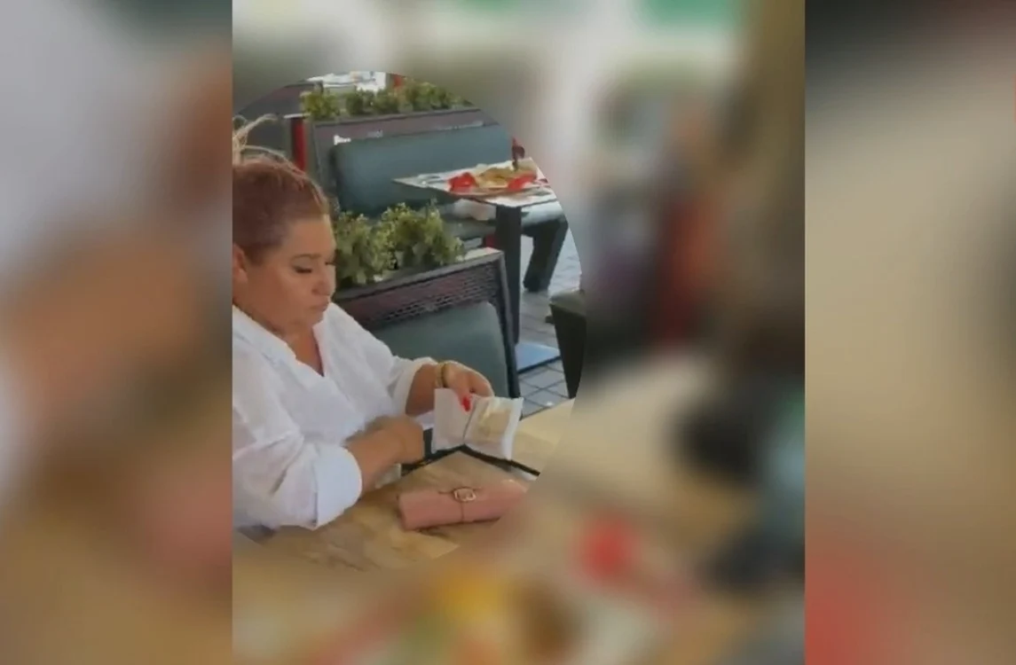 Valerica Șapera, prinsă cu banii în geantă. FOTO: captură video Mediafax