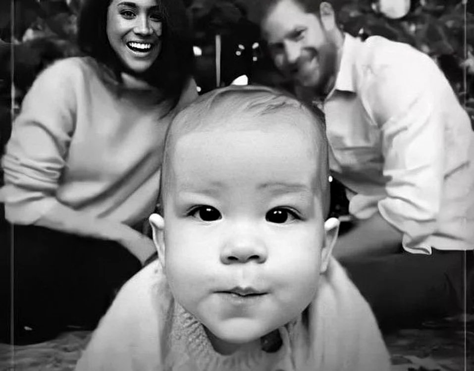 
    Archie, Meghan și Harry  