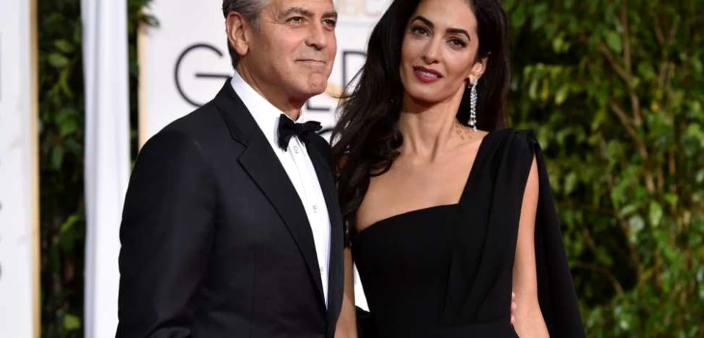 Cuplul george-Mala Clooney a devenit unodel pentru bărbaţii moderni FOTO: AP