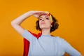 close up portrait winsome girl blue shirt standing confident pose yellow space jpg