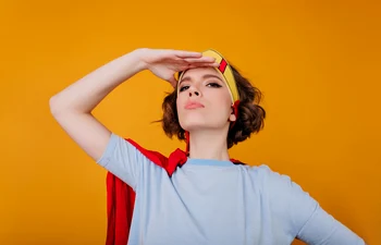close up portrait winsome girl blue shirt standing confident pose yellow space jpg