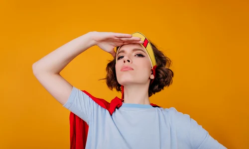 close up portrait winsome girl blue shirt standing confident pose yellow space jpg