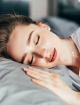 beautiful young brunette woman sleeping white bed jpg