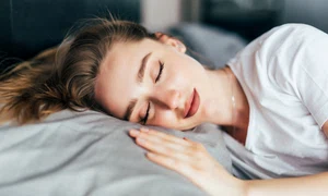 beautiful young brunette woman sleeping white bed jpg