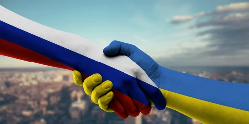 Rusia şi Ucraina îşi strâng mâinile Foto Shutterstock