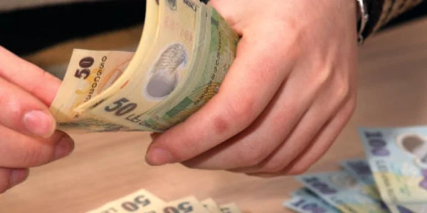 Românii preferă economiile în lei datorită dobânzilor mai mari 