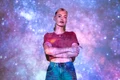 portrait woman posing with universe projection texture jpg
