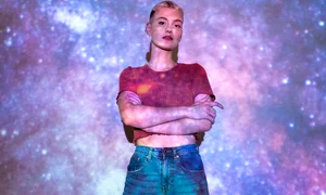 portrait woman posing with universe projection texture jpg