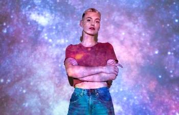 portrait woman posing with universe projection texture jpg