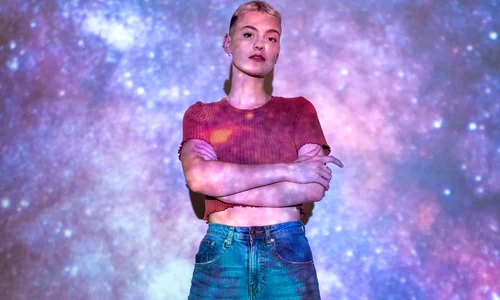 portrait woman posing with universe projection texture jpg