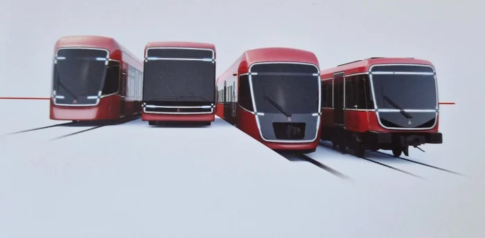 Machete de tramvai, tren, metrou și autobuz, toate de culoare roșie