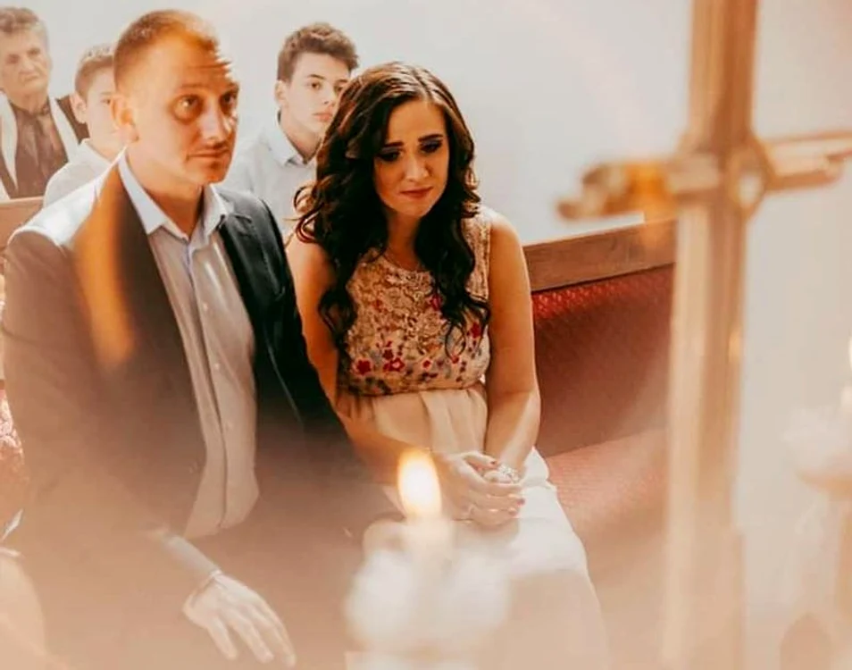 Don Baxter şi Teo, autoarea reţetelor de pe blogul culinar Teo's Kitchen, la slujba de creştinare a fetiţei lor Foto: arhivă personală