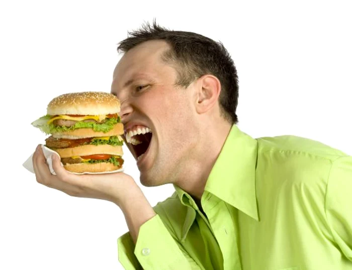 Alimentele de tip fast food, pline de e-uri şi chimicale, pot duce la apariţia acneei