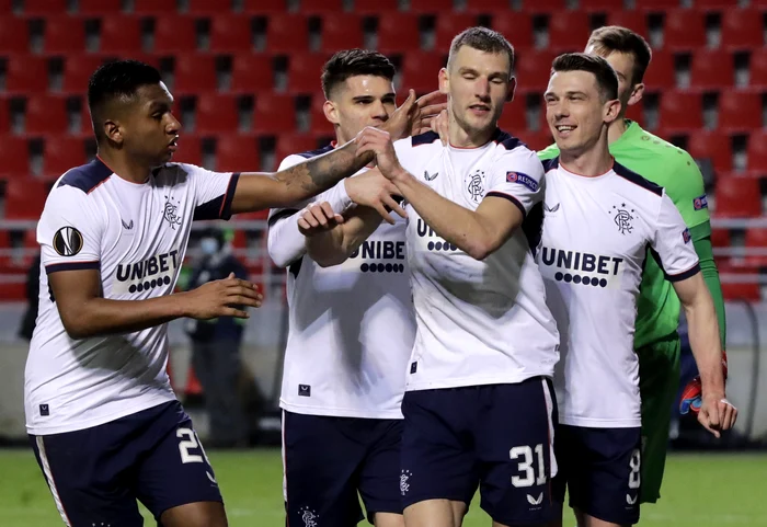 
    Ianis Hagi și ai săi colegi sărbătoresc succesul din BelgiaFoto: EPA-EFE  