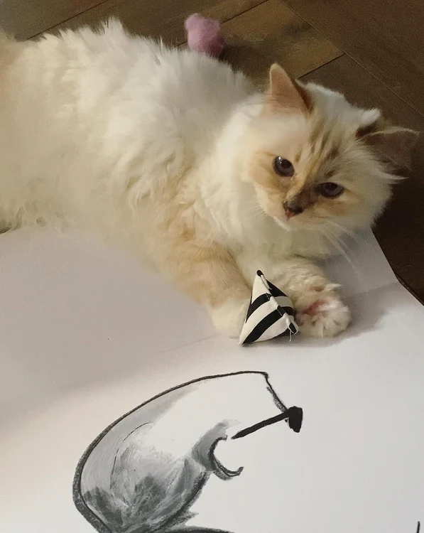Karl Lagerfeld (1933-2019), alături de Choupette